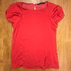 Red Zara blouse with detailed puffy sleeves. Size medium.